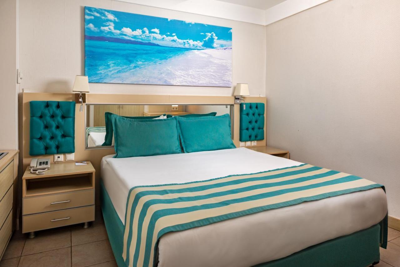 Aqi Hydros Club Hotel Kemer Exterior foto A bedroom at the Iberostar Grand Hotel Bávaro